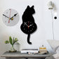 Nordische Wanduhr in Katzenform mit wedelndem Schwanz