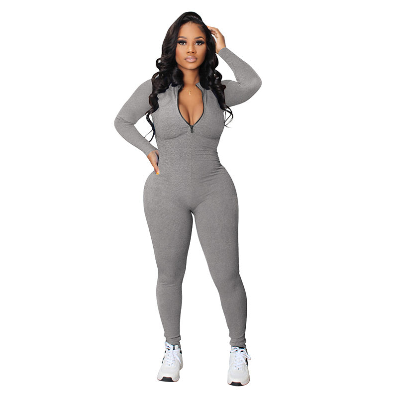 Einfarbiger nahtloser Jumpsuit mit halbem Reißverschluss