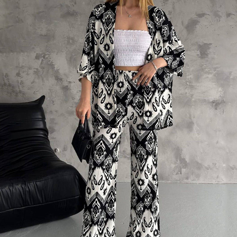 kostenloser Versand！！！🌸Zweiteiliges Set aus bedruckter Strickjacke mit halblangen Ärmeln und trendiger Hose mit weitem Bein