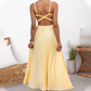 Sexy Trägerkleid mit offenem Rücken und Plisseerock